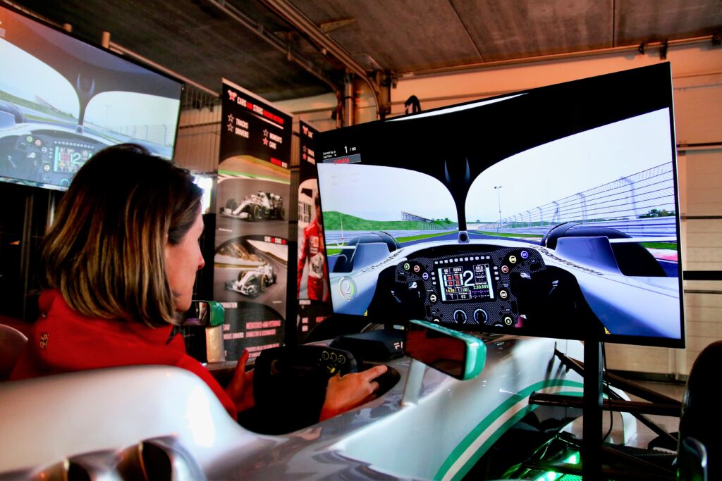 a guest from the showcase event braves a formula one simulator